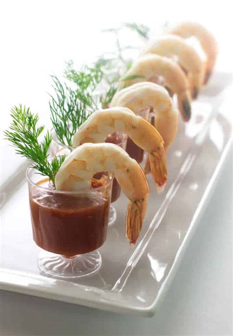 Just top melba toasts with a bit of cream cheese, a cooked shrimp and dollop of pepper jelly. Shrimp Cocktail Appetizers - Savor the Best