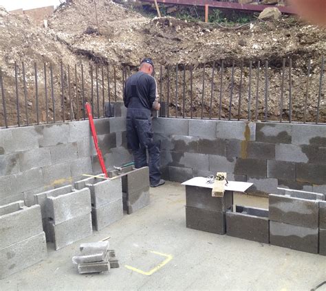 One job is supporting the house; Stepoc® Retaining Walls for Basement Construction