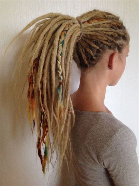 dreadlocks with yarn braids as decorations dreadlocks girl blonde dreads wool dreads