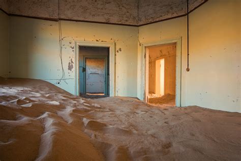 Sand Dunes Taking Over An Abandoned House In Kolmanskop Namibia