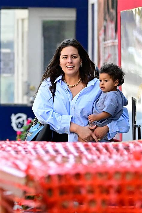 Ashley Graham Carries Her Son As She Leaves A Restaurant In New York City