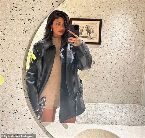 Kylie Jenner Puts On A Leggy Display In A Beige Romper As She Shares Fashionable Selfies Daily