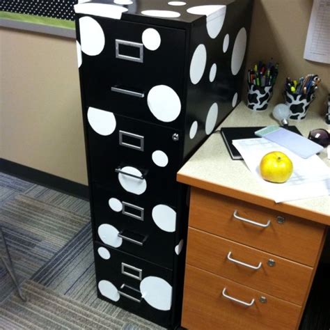 How do you want to organise the files in your filing cabinet? Polka-dot file cabinet. White contact paper and scissors ...