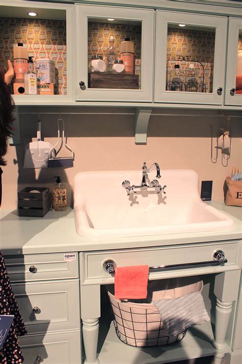 It is one of the new farmhouse sinks, but the short apron style is for a standard sink base cabinet. Checking out the Nelson's sink on display at KBIS