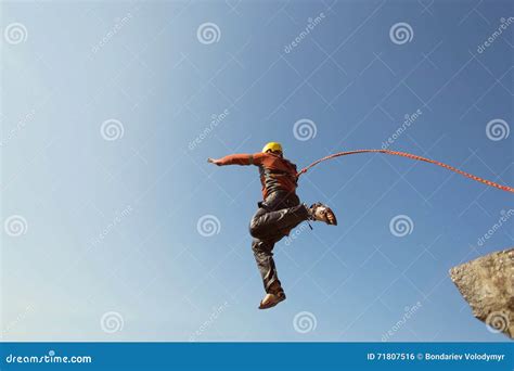 Jump Off The Cliff With A Rope Stock Photo Image Of Rope Extreme