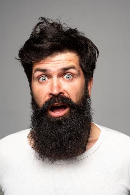 Premium Photo Bearded Stylish Businessman Is Surprised Shocked Man