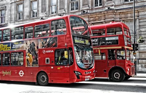 london buses on whitehall an old routemaster and a newer m… flickr