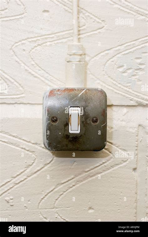 An Industrial Light Switch On A White Wall Stock Photo Alamy