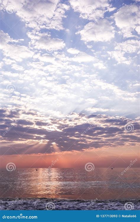 View Of Seascape With Beautiful Sky With Clouds And Sunbeams On Sunrise