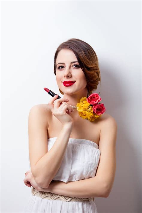 Portrait Of Beautiful Young Woman With Lipstick On The Wonderful Stock
