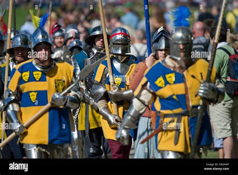 Re Enactors Dressed As Medieval Knights And Men At Arms Parade At The