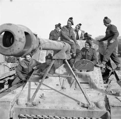 Troops Clamber Over A Captured German Hornisse 88mm Self Propelled