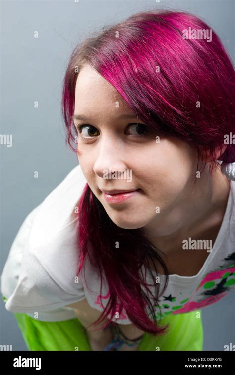 Emo Look Girl With Red Hair On Gray Background Stock Photo Alamy