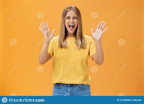 Woman Releasing Stress Yelling With Joy And Pleasure Gesturing With