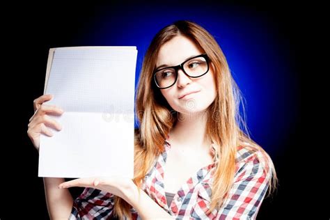 Happy Young Girl With Nerd Glasses Holding Exercise Book Stock Image