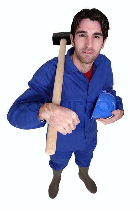 worker with a sledgehammer stock image colourbox