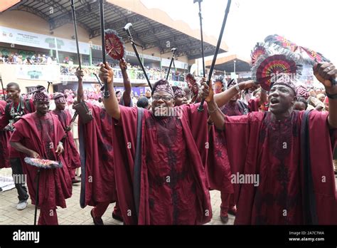 Nigerian Men Dancing With Their Traditional Stick In Paying Homage To