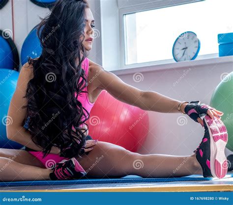 In Gym Image Of Woman Doing Stretching Exercise Stock Photo Image Of