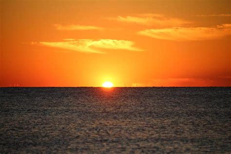 Sunrise Over The Sea Photograph By Cynthia Guinn Fine Art America