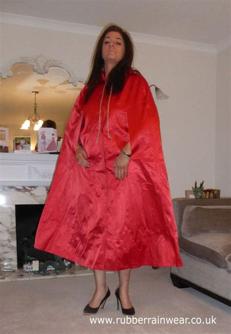 Look At This Gorgeous Gal Dressed In Red Rubberrain Wear Rain Wear Get Dressed Beautiful Coat