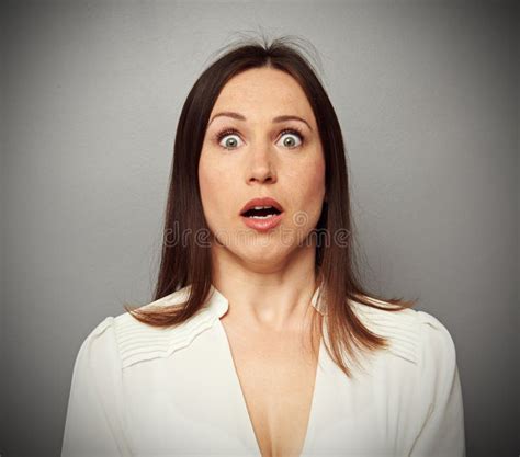 Frightened Woman Looking At Camera Royalty Free Stock Photography