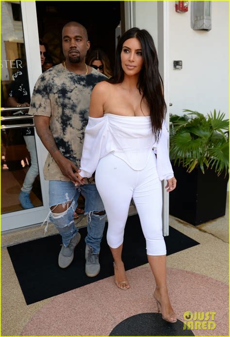 Kim Kardashian Flaunts Curves And Cleavage In White Jumpsuit Photo