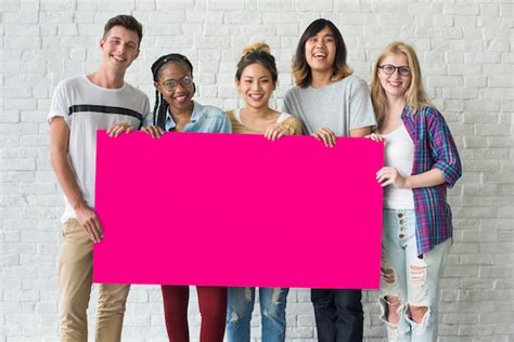Premium Photo Group Of Friends Holding Blank Banner