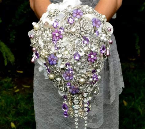 White hydrangea bouquet with silver brooches. Unforgettably Yours Event Planning Service Blog: 4 Unique ...