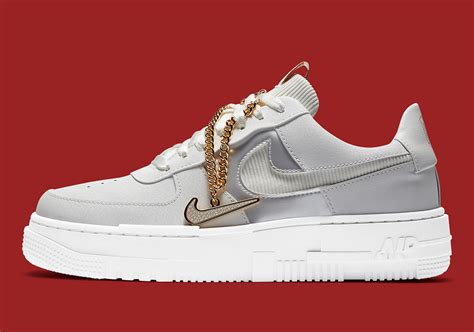 The midsole boasts angular details, while the oversized heel tab sports geometric nike. Nike Air Force 1 Pixel Grey Gold Chain DC1160-100 ...