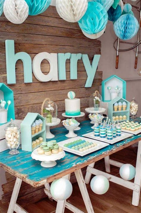 It was a really exciting weekend for us because we hosted a baby shower for our dear friend marie who's having a baby boy! Rustic Beach Ball Birthday Party | Kara's Party Ideas ...