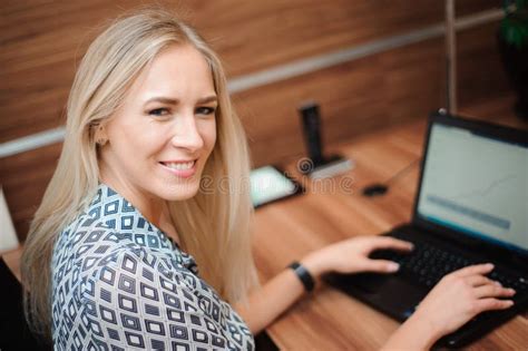 Beautiful Business Woman Working With Sales In Her Office Stock Image