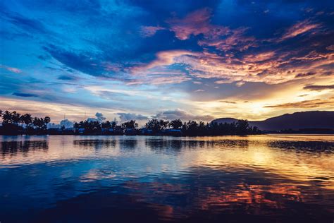 Sky Clouds Sunset Sunrise Reflection Water Free Image Peakpx