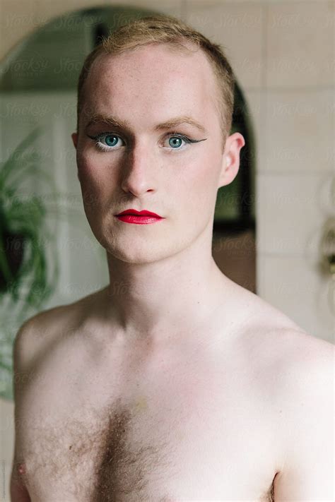 Inclusivity is in our dna. Non binary guy in the process of doing his make up for a ...