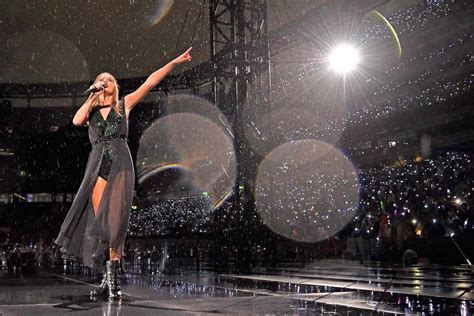 Taylor Swift Falls During Rainy Concert And Laughs While Getting Up