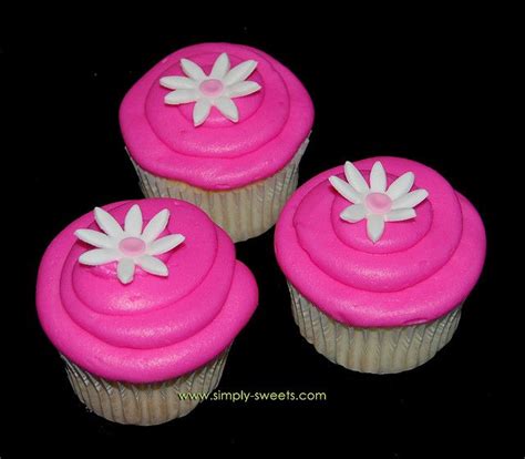 Hot Pink Cupcakes With Flower By Simply Sweets Via Flickr Pink