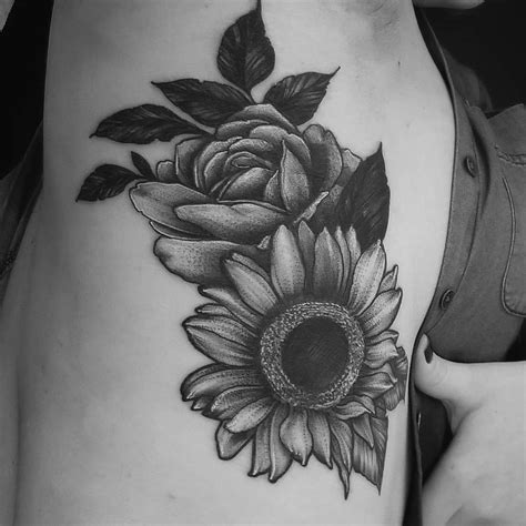 The rose and skull tattoo is a popular tattoo and symbolizes both sides of the spectrum. KoZo on Instagram: "Coverup did today... #kozotattoo # ...