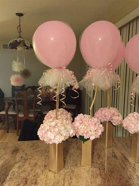 Welcome the new season with a spring party from shindigz! Baby shower centerpieces | Baby shower princess, Baby ...