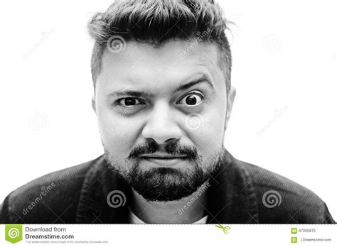 Close Up Studio Portrait Man Baffled Facial Expression On White Stock