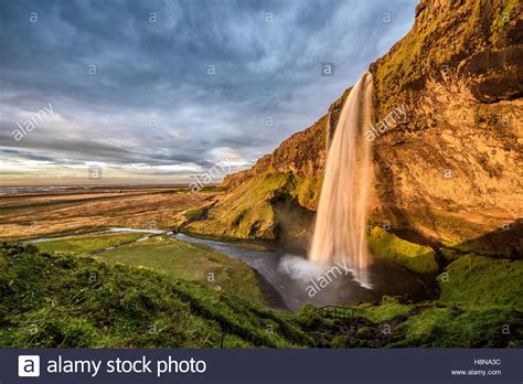 Seljalandsfoss Waterfall In Iceland At Sunset Hdr Processed Stock