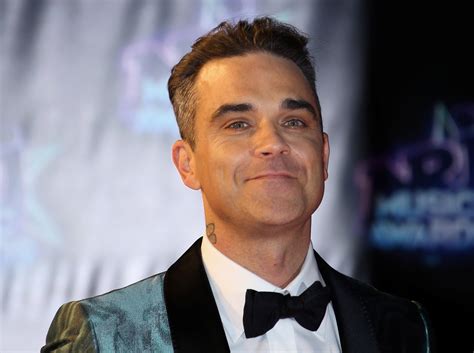 Whats Happened To Robbie Williams Face Fans Beg Star Please Stop