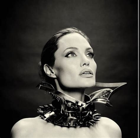 Black And White Photograph Of A Woman With Scissors On Her Neck