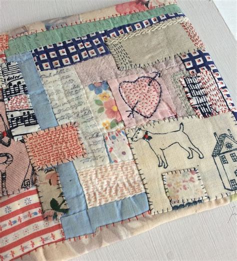 A Hand Stitched Patchwork With Printed Detail And Scraps Of A Vintage