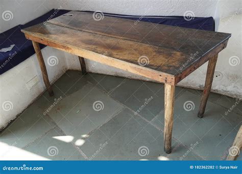 Dark Ugly Old Damaged Wooden Table Kept Outside A House In A Village A
