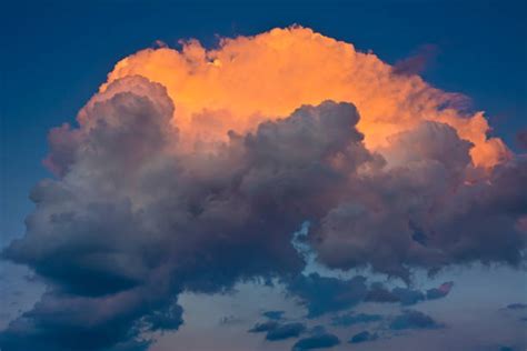 Fluffy Clouds Sunset Stock Photos Pictures And Royalty Free Images Istock