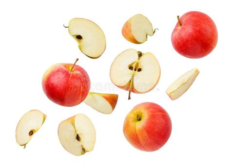 Falling Apples Whole And Pieces On A White Background Cut Isolated