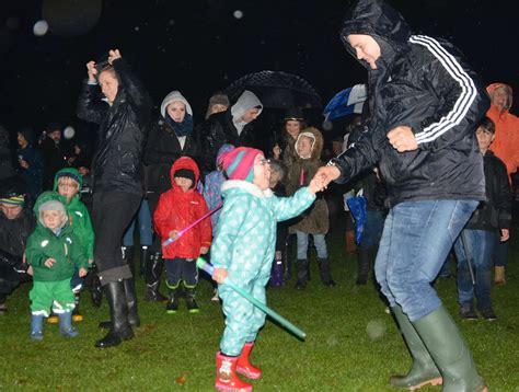 People Dance Through The Rain To Enjoy The Banstead Fireworks Surrey Live