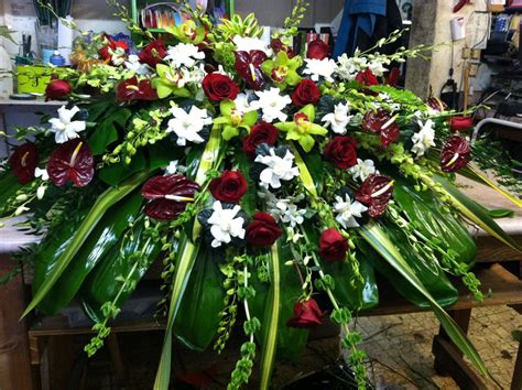 Shop our selection of artificial wild flowers, perfect for any fake flower arrangement. Casket Spray - Burgundy and White | Funeral flowers ...