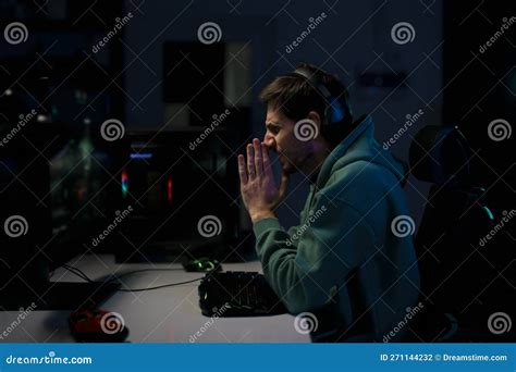 Male Cybersport Gamer Sitting With Prayer Hands Stock Photo Image Of
