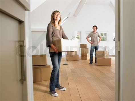Couple Moving Into New Home Smiling Stock Image Everypixel