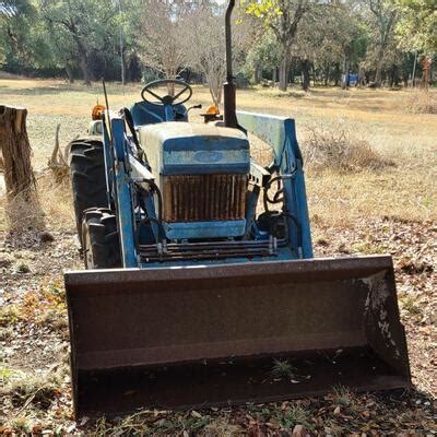 But if it has been sitting all winter, check the oil before you even try to start it. Ford 1710 Tractor w/ 770A Loader | EstateSales.org